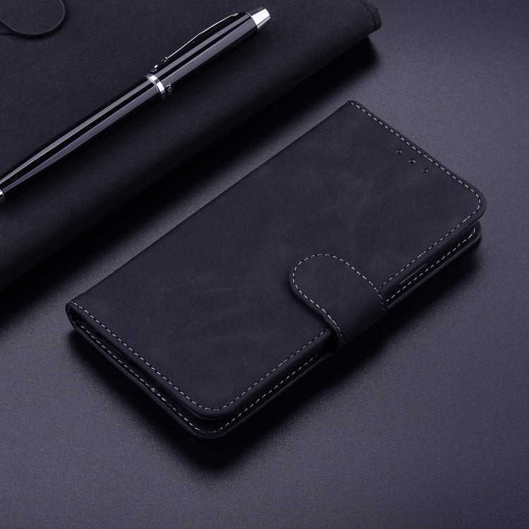 For iPhone 16e Skin Feel Pure Color Flip Leather Phone Case(Black) - iPhone 16e Cases by PMC TechLife | Online Shopping South Africa | PMC TechLife | Buy Now Pay Later Mobicred