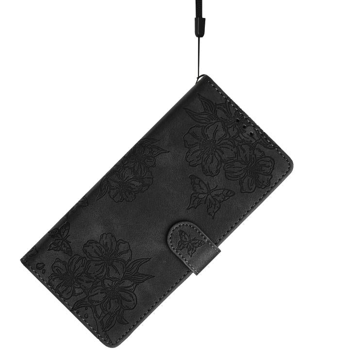 For iPhone 16e Cherry Blossom Butterfly Skin Feel Embossed PU Phone Case(Black) - iPhone 16e Cases by PMC TechLife | Online Shopping South Africa | PMC TechLife | Buy Now Pay Later Mobicred