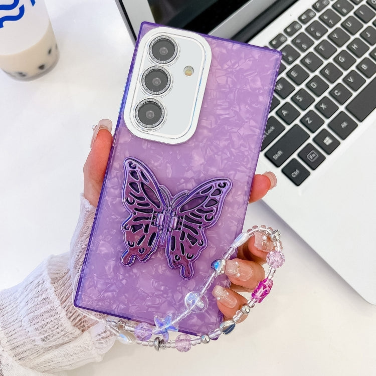 For Samsung Galaxy S25+ 5G Plating Glitter Lens Film Texture Butterfly Holder Wristband Phone Case(Purple Shell Pattern) - Galaxy S25+ 5G Cases by PMC Jewellery | Online Shopping South Africa | PMC Jewellery | Buy Now Pay Later Mobicred