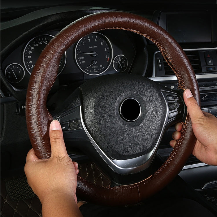 38cm Four-season Embossed Cowhide Hand-sewn Steering Wheel Cover(Brown) - Steering Wheel Accessories by PMC TechLife | Online Shopping South Africa | PMC TechLife | Buy Now Pay Later Mobicred